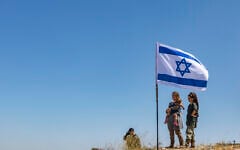 People attend cornerstone-laying ceremony for a new settlement named Doran in the Mount Hebron region of the West Bank, June 16, 2026. (Chaim Goldberg/Flash90)