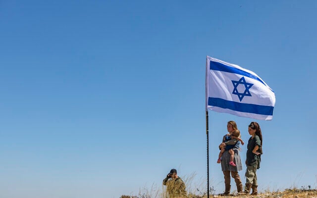 People attend cornerstone-laying ceremony for a new settlement named Doran in the Mount Hebron region of the West Bank, June 16, 2026. (Chaim Goldberg/Flash90)