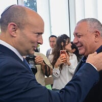Yashar party leader Gadi Eisenkot, right, and B'Yachad party chief Naftali Bennett meet at the Herzliya Conference at the Reichman University in Herzliya, July 1, 2026. (Avshalom Sassoni/Flash90)