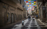 Illustrative: A largely empty pedestrian mall in central Jerusalem on August 2, 2026. (Yonatan Sindel/Flash90)