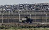 Israeli soldiers seen on the Israeli border with the Gaza Strip, August 5, 2026. (Tsafrir Abayov/Flash90)