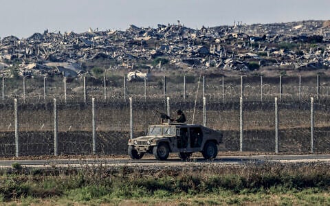 Israeli soldiers seen on the Israeli border with the Gaza Strip, August 5, 2026. (Tsafrir Abayov/Flash90)