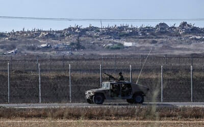 IDF soldiers seen on the border with the Gaza Strip, August 5, 2026. (Tsafrir Abayov/Flash90) IDF soldiers seen on the border with the Gaza Strip, August 5, 2026. (Tsafrir Abayov/Flash90)