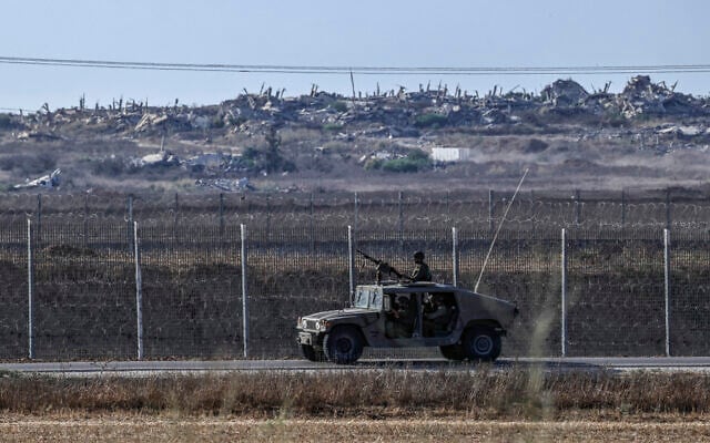 IDF soldiers seen on the border with the Gaza Strip, August 5, 2026. (Tsafrir Abayov/Flash90)