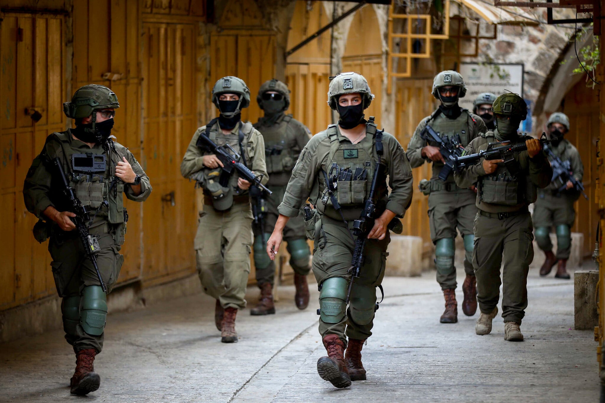 IDF probes video appearing to show soldier beating Palestinian alongside settlers