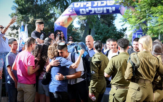 New recruits to the IDF's Golani Brigade arrive at Ammunition Hill in Jerusalem, on their enlistment day, August 10, 2026. (Flash90)