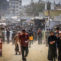 Illustrative: Palestinians in Khan Younis, the southern Gaza Strip, August 12, 2026. (Abed Rahim Khatib/FLASH90)