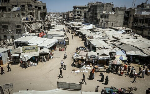 Palestinians in Khan Younis, the southern Gaza Strip, August 12, 2026. (Abed Rahim Khatib/FLASH90)