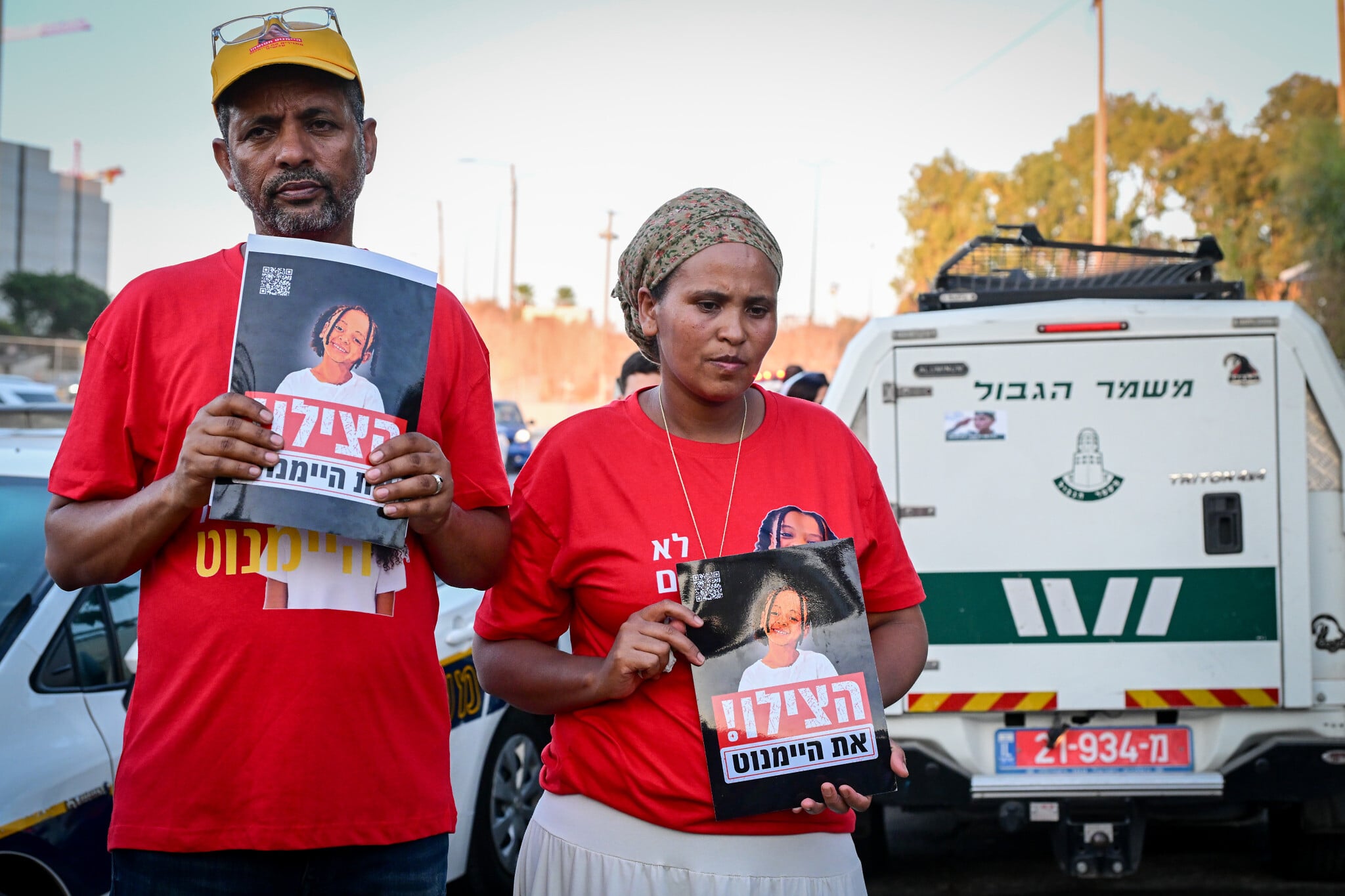 Family of missing girl Haymanut Kasau protests outside Shin Bet headquarters