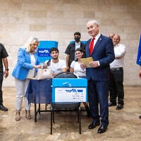 Prime Minister Benjamin Netanyahu and his wife Sara vote in Jerusalem in the Likud primary, August 17, 2026, as Likud members help determine the party’s Knesset slate ahead of Israel's October 27 general elections. (Chaim Goldberg/Flash90)
