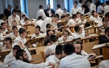 Illustrative: Jewish yeshiva students study at the Kamenitz Yeshiva, in Jerusalem on August 19, 2026. (Chaim Goldberg/Flash90)