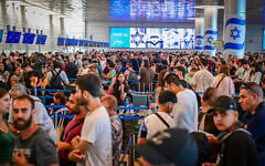 Thousands of passengers wait at Ben Gurion International Airport near Tel Aviv after operations shut down on August 20, 2026. (Avshalom Sassoni/Flash90)