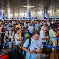 Thousands of passengers wait at Ben Gurion International Airport near Tel Aviv after a strike was announced, August 20, 2026. (Avshalom Sassoni/Flash90)