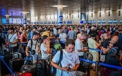 Thousands of passengers wait at Ben Gurion International Airport near Tel Aviv after a strike was announced, August 20, 2026. (Avshalom Sassoni/Flash90)