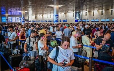 Thousands of passengers wait at Ben Gurion International Airport near Tel Aviv after a strike was announced, August 20, 2026. (Avshalom Sassoni/Flash90) Thousands of passengers wait at Ben Gurion International Airport near Tel Aviv after a strike was announced, August 20, 2026. (Avshalom Sassoni/Flash90)