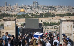 Family members and mourners attend the funeral of IDF soldier Yehuda Katz, whose body was returned from Lebanon this week, 44 years after he went missing in battle, at the Mount of Olives cemetery in Jerusalem, August 21, 2026. (Chaim Goldberg/Flash90)