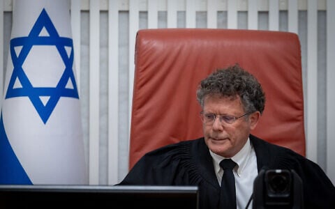 Supreme Court President Isaac Amit  presides over a court hearing, August 26, 2026. (Chaim Goldberg/FLASH90)
