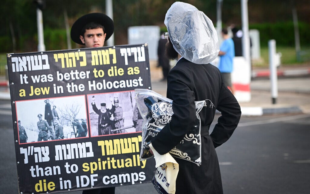 Haredi anti-draft protesters block roads at IDF induction center for second day