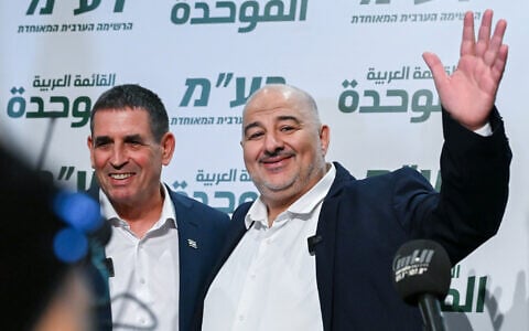Yoav Segalovitz, left, and Ra'am party chairman Mansour Abbas at a press conference announcing a joint Knesset run, in Nazareth. August 31, 2026. (Michael Giladi/FLASH90)