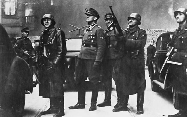 Jurgen Stroop watches his troops raze the Warsaw Ghetto. (CORBIS/Corbis via Getty Images via JTA)
