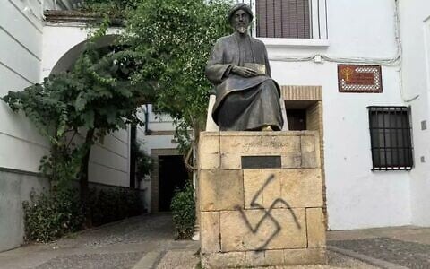 Swastika graffiti on a statue of Maimonides in Cordoba, Spain, discovered on August 1, 2026. (European Jewish Congress on X)