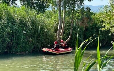 Rescuers search for Elhanan Karni, 12, after he fell into the Jordan River in northern Israel, August 9, 2026. He was later found and pronounced dead at the scene. (Israel Fire and Rescue Service) Rescuers search for Elhanan Karni, 12, after he fell into the Jordan River in northern Israel, August 9, 2026. He was later found and pronounced dead at the scene. (Israel Fire and Rescue Service)