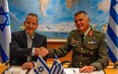 Defense Ministry Director General Amir Baram (left) and his Greek counterpart, Ioannis Bouras,  sign a sale of Israeli systems to Greece, August 31, 2026. (Defense Ministry)