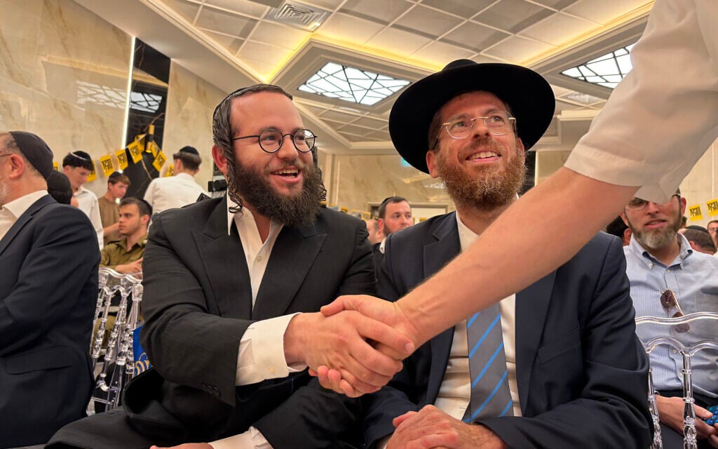 Moti Leitner, chairman of The Charedi Public, and Rabbi Yehoshua Pfeffer, head of the party's rabbinic committee, attend the kick-off of the new ultra-Orthodox faction's Knesset campaign in Beit Shemesh, August 23, 2026. (Sam Sokol/Times of Israel)