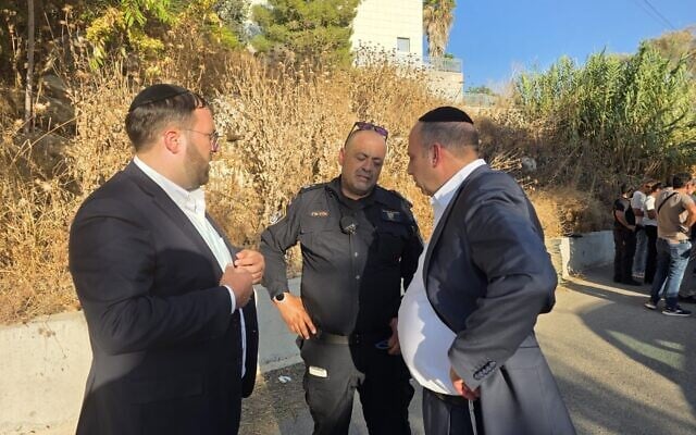 Beit Shemesh Mayor Shmuel Greenberg meets with police in the aftermath of the stabbing of two children, August 17, 2026. (Eldad Peretz/Beit Shemesh Mayor's Office)