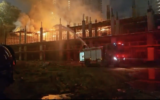 Firefighters work to extinguish a blaze at a construction site in Petah Tikva, August 8, 2026. (Fire and Rescue Services screenshot)