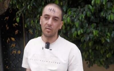 A Palestinian marked by IDF soldiers during a raid of the northern West Bank village of Qabatiya on August 17, 2026. (Screen capture/X)