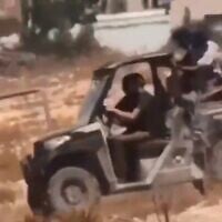 Settlers appear to steal belongings from a Palestinian home in the southern West Bank, August 26, 2026. (Social media, used in accordance with Clause 27a of the Copyright Law)