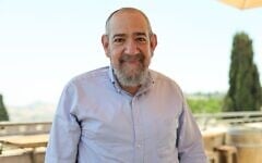 Rabbi Jeffery Woolf at the Montefiore windmill in Jerusalem, July 2026 (Yitzchak Ledee)