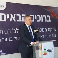 Education Minister Yoav Kisch speaks at the inauguration of a school for so-called hilltop youth in the West Bank settlement of Beit El, August 4, 2026. (Arye Minkov/Beit El Municipal Council)