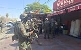 Troops at the scene of a stabbing attack in al-Auja in the West Bank on August 23, 2026. (IDF)