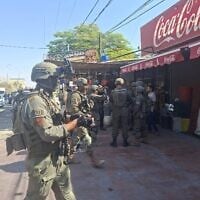 Troops at the scene of a stabbing attack in al-Auja in the West Bank on August 23, 2026. (IDF)