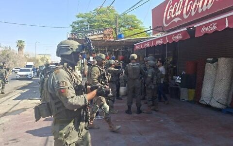 Troops at the scene of a stabbing attack in al-Auja in the West Bank on August 23, 2026. (IDF)