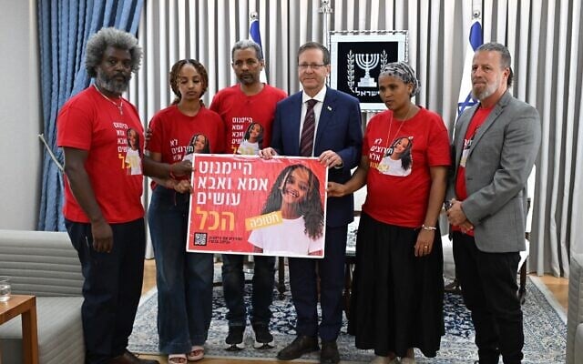 The family of missing girl Haymanut Kasau meet with President Isaac Herzog (center) in his office in Jerusalem on August 25, 2026. (Haim Zach/GPO)