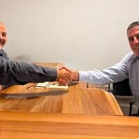 Ra'am chairman Mansour Abbas (left) and former Yesh Atid MK Yoav Segalovitz in a handout photo released by the party on August 26, 2026. (Courtesy)