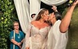 Former hostage Emily Damari, right, marries Danielle Amit, center; Damari's mother, Mandy Damari, far left, on August 27, 2026 (Courtesy)