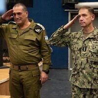 IDF Chief of Staff Lt. Gen. Eyal Zamir, left, and US Central Command chief Adm. Brad Cooper salute during an event in Israel, August 10, 2026. (IDF)