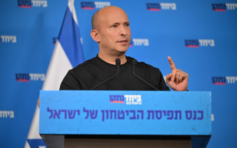 Former prime minister Naftali Bennett addresses a 'security concept conference' held by his B’Yachad party, August 19, 2026. (Elad Gutman)