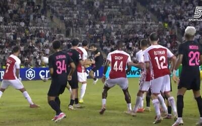 Sabah's Tellur Mutallimov (at rear, center) shoots home in the final seconds of stoppage time to force extra time in his team's home match against Hapoel Beersheba, on August 25, 2026. The Azerbaijani team eventually won the game by 5-2, for an aggregate 6-4 win, qualifiying at Hapoel's expense for the European Champions League. (Israel Sports Channel 5 screenshot) Sabah's Tellur Mutallimov (at rear, center) shoots home in the final seconds of stoppage time to force extra time in his team's home match against Hapoel Beersheba, on August 25, 2026. The Azerbaijani team eventually won the game by 5-2, for an aggregate 6-4 win, qualifiying at Hapoel's expense for the European Champions League. (Israel Sports Channel 5 screenshot)