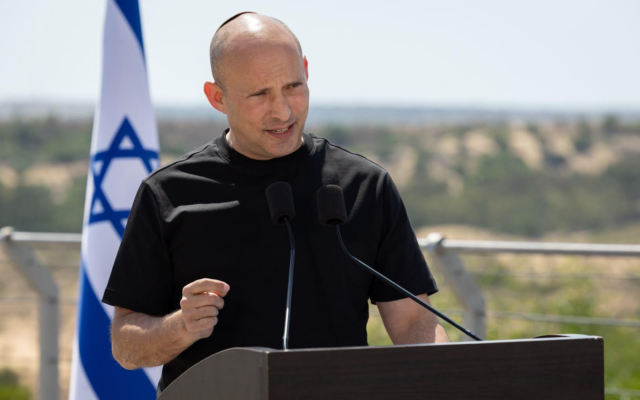 Naftali Bennett speaking at the  Gaza border town of Netiv Ha’asara, August 4, 2026. (Courtesy Together party)