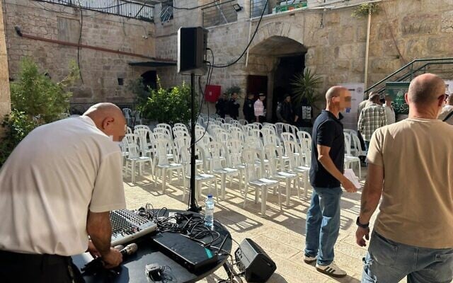 Chairs are lined up ahead of a graduation ceremony at the Khan Tankaz compound in the Cotton Merchants’ Market in the Old City of Jerusalem on August 24, 2026. (Israel Police)