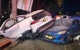 Cars are seen at the a-Tur Junction in Jerusalem after a suspected car thief got into an accident during a police chase, in a picture published by police on August 26, 2026. (Israel Police)