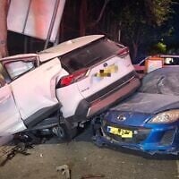 Cars are seen at the a-Tur Junction in Jerusalem after a suspected car thief got into an accident during a police chase, in a picture published by police on August 26, 2026. (Israel Police)