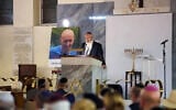Heaton Park Synagogue's Rabbi Daniel Walker speaks at a memorial service for victims of the 2025 Yom Kippur terror attack, August 31, 2026 (Courtesy Jewish Representative Council of Greater Manchester and Region)