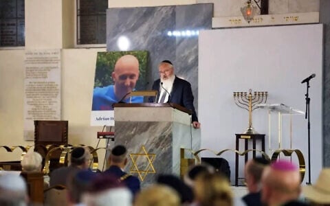 Heaton Park Synagogue's Rabbi Daniel Walker speaks at a memorial service for victims of the 2025 Yom Kippur terror attack, August 31, 2026 (Courtesy Jewish Representative Council of Greater Manchester and Region)