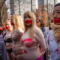 Protesters demonstrate in support of Israeli victims of sexual violence, outside the United Nations in New York City, December 4, 2023. (Luke Tress/Times of Israel)
